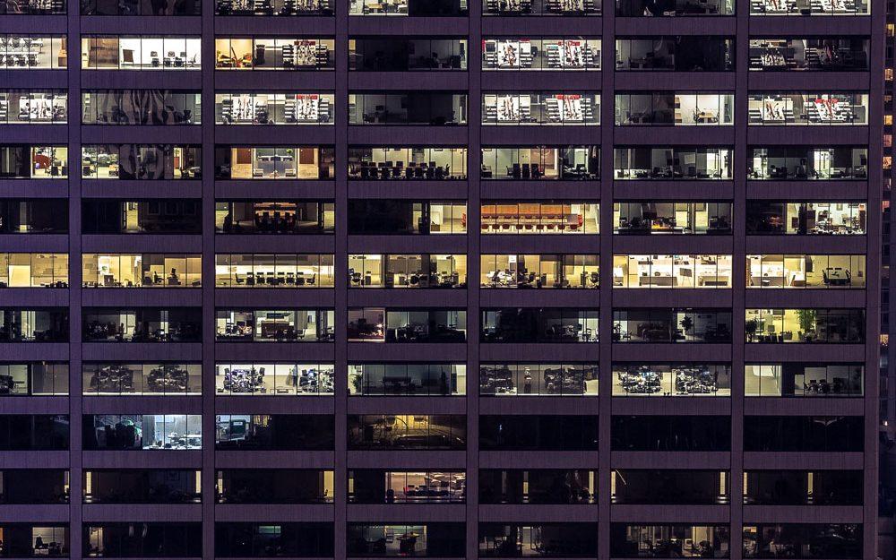 offices in a skyscraper at night 