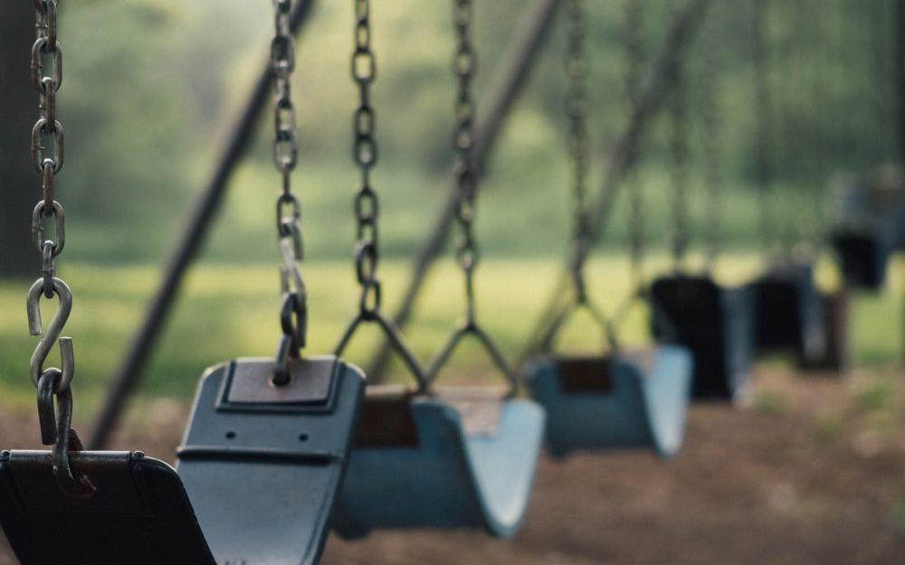 empty swings at a park