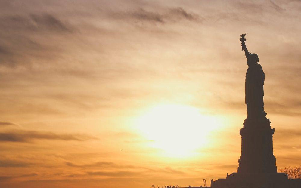 statue of liberty at sundown